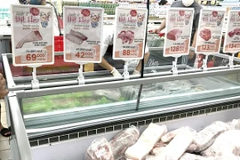 Imported pork at a Big C supermarket in HCM City. (Photo vietnammoi.vn) 