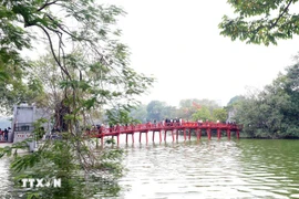 The Huc Bridge spanning Hoan Kiem Lake, an icon of Hanoi (Photo: VNA)