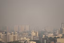Skyscrapers are seen shrouded by polluted air in Jakarta (Photo: AFP)