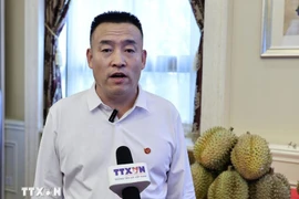 Li Xiapeng from the Hebei Kinghey Catering Services Company (Photo: VNA)