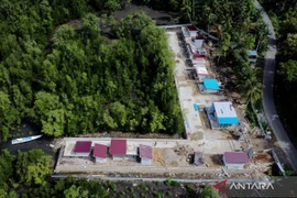 An aerial view shows construction work at the Red and White Fishermen Village (KNMP) infrastructure project in Sumare village, Mamuju, West Sulawesi, Indonesia (Photo: Antara)