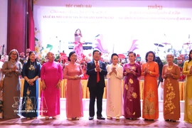 The Executive Committee of the Vietnam Ao Dai Heritage Club in Laos make debut. (Photo: VNA)