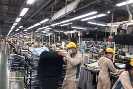 Workers in a production shift at Toyota Boshoku Hanoi (Photo: VNA)