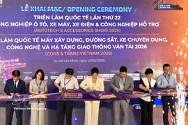 Delegates cut the ribbon to open the exhibition series on May 21, 2026 (Photo: VNA) 