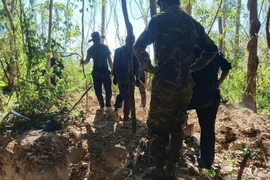 The K53 Team of the Quang Ngai provincial military command carries out search and recovery operations for the remains of fallen soldiers in Laos. (Photo: VNA) 