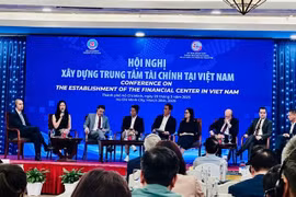 Speakers at a conference in HCM City on March 28 on creating a financial centre in Vietnam (Photo: VNA). 