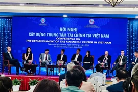 Speakers at a conference in HCM City on March 28 on creating a financial centre in Vietnam (Photo: VNA). 