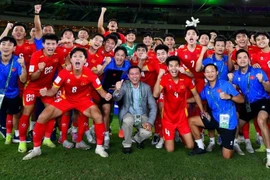 The joy of U23 Vietnam players after the victory. (Photo: Asian Football Confederation) 