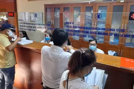 The new decree is expected to remove bottlenecks and create a more transparent legal framework for both tax authorities and taxpayers. (Photo: VietnamPlus)