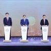 Prime Minister Pham Minh Chinh (middle) and delegates launch the Trump International Hung Yen project on May 21 with the ceremonial button-pressing. (Photo: VNA)