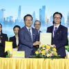 Representatives from Nam A Bank and the Swiss Investment Fund for Emerging Markets (SIFEM AG) at the signing ceremony. (Photo: VNA)
