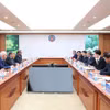 At the meeting between Minister of Finance Ngo Van Tuan held talks with Yasushi Masaki, visiting Deputy Secretary-General of the Organisation for Economic Co-operation and Development, in Hanoi. (Photo: thoibaotaichinhvietnam.vn)