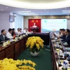 The People’s Committee of Vinh Long province holds a working session with Singapore’s Sembcorp Industries on December 22. (Photo: VNA)
