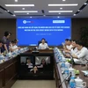 Nguyen Duc Thien, General Director of Vietnam Electricity (EVN)’s Northern Power Corporation (centre), chairs the working session with credit rating organisation Fitch Ratings (Photo: npc.com.vn)