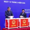 Party General Secretary To Lam (first, left) casts his ballot to elect deputies to the 16th National Assembly and People’s Councils at all levels for the 2026-2031 tenure on March 15. (Photo: VNA)