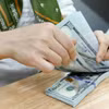 The daily reference exchange rate is set at 25,102 VND/USD on April 9. (Photo: VNA)