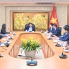 Deputy Prime Minister Nguyen Chi Dung (centre) hails the NAB Innovation Centre Vietnam’s achievements, particularly its contributions to developing high-quality technology human resources and supporting Vietnam’s innovation and digital transformation ecosystem. (Photo: VGP)