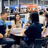 Domestic and foreign businesses engage in trade networking at the event series held at Ho Chi Minh's Saigon Exhibition and Convention Centre (SECC) on August 13, 2026. (Photo: VNA)