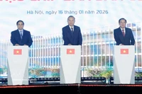 Party General Secretary To Lam (centre), Prime Minister Pham Minh Chinh (left), and Chairman of the Party Central Committee’s Commission for Internal Affairs Phan Dinh Trac mark the start of work on a high-tech semiconductor manufacturing plant in Hanoi on January 16, 2026. (Photo: VNA) 