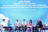 A panel discussion at the conference reviewing five years of implementing Project 1797. (Photo: VNA)
