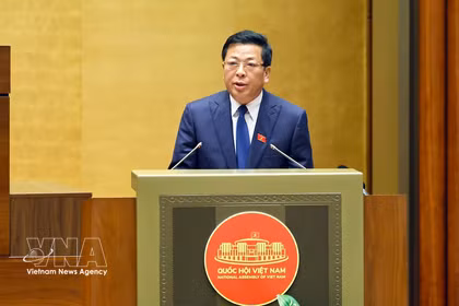 Minister of Construction Tran Hong Minh speaks at the session (Photo: VNA)