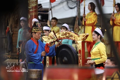 The ritual of praying for a good harvest is performed at the festival. (Photo: VNA)