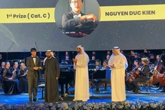 Nguyen Duc Kien wins first prize at the 6th Fujairah International Piano Competition. (Photo: Nhan Dan)