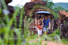 International visitors admire the beauty of the My Son Cham sanctuary in Duy Xuyen, Da Nang. (Photo: VNA)