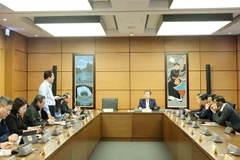 The National Assembly holds group discussions during the extraordinary session on February 14. (Photo: VNA)