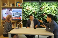 Kwon Hyuk Min (C) speaks with a VNA correspondent in the Republic of Korea about Viet Nam–RoK relations. (Photo: VNA) 