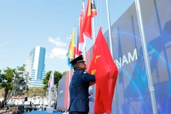 Flag-raising ceremony of the Vietnamese sports delegation at the 33rd SEA Games. (Photo: VNA)