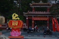 Banners and decorations welcoming the 14th National Congress of the Communist Party of Vietnam are displayed at the central park in Hue city. (Photo: VNA)