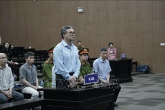 Former Deputy Minister of Industry and Trade Hoang Quoc Vuong at the court hearing on April 21, 2025. (Photo: VNA)