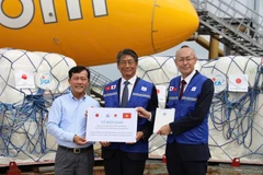 JICA provides essential supplies to residents in Bac Ninh. (Photo: Vietnam Disaster and Dyke Management Authority)