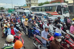 People commute in Ho Chi Minh City. (Photo: VNA)