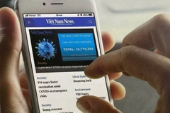 With the Vietnam News Daily mobile app, readers can access Vietnam News anytime, anywhere. (Photo published by VNA)