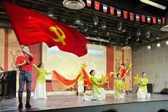 A musical performance at the celebration of the 95th anniversary of the Communist Party of Vietnam in France on February 2 (Photo: VNA)