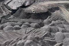 An aerial photo shows heavy vehicles and machinery being operated to collect coal along the coast of Peunaga Cut Ujong, Meureubo district, Aceh, on January 9, 2026. (Photo: Antara)