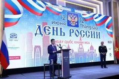 Deputy Prime Minister Le Thanh Long delivers remarks at the reception marking Russia’s National Day, June 12. (Photo: baochinhphu.vn)