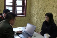 Hoang Thi Hong Thai at the police office. (Photo: Hanoi Department of Public Security)