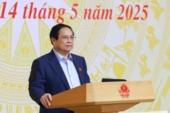 Prime Minister Pham Minh Chinh chairs the working session with ministries, central agencies, and relevant units on smuggling, trade fraud. (Photo: VNA)