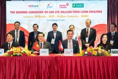 Representatives at the signing ceremony. (Photo Courtesy of HDBank)