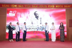 Delegates perform the launch ceremony for the “A80 – Proud of Vietnam” digital platform. (Photo: VNA)