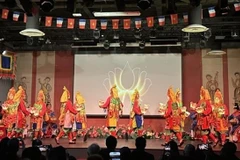 A royal court music performance at the tourism promotion event in Paris. (Photo: VNA)