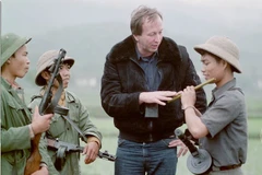 Photographer Thomas Billhardt and Vietnamese soldiers. (Photo courtesy of Thomas Billhardt) 