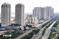 Apartment buildings along Metro Line 1 and Vo Nguyen Giap Boulevard, Thu Duc city. (Photo: VNA)