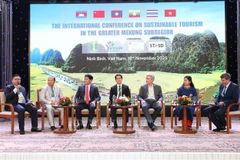Delegates share experiences in sustainable tourism development. (Photo: VNA)
