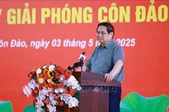 Prime Minister Pham Minh Chinh speaks in tribute to revolutionaries who were imprisoned by the enemy. (Photo: VNA)