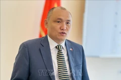 Ambassador of the Republic of Kazakhstan to Vietnam, Kanat Tumysh, speaks to the press about the visit and bilateral cooperation. (Photo: VNA)