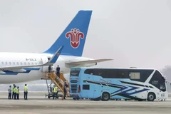 Chinese nationals, believed to have worked at scam centres in eastern Myanmar, board a plane at Thailand’s Mae Sot International Airport before sent back to China on February 20, 2025. (Photo: AP)